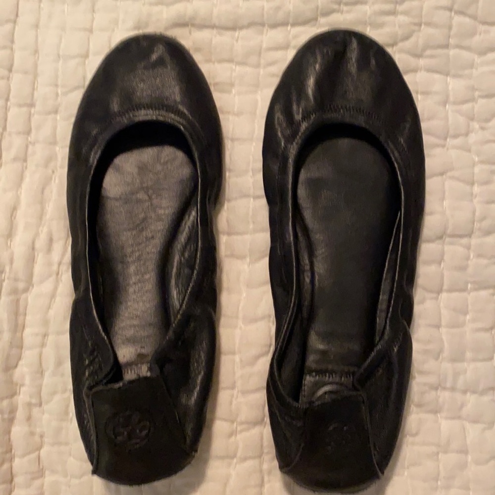 Black Tory Burch flats.